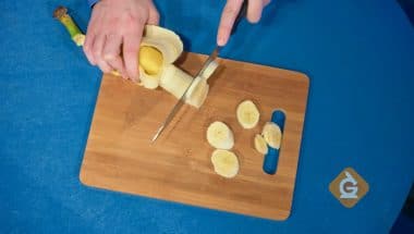 chopping a banana with a knife which is a physical change