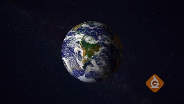 view of earth from space showing daytime and night