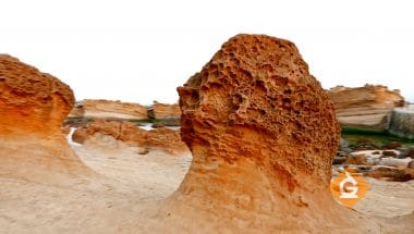 a rock from the geosphere that has been shaped by wind