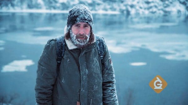 man freezing with ice growing on his beard