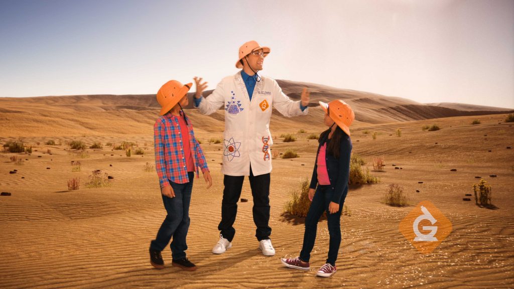 scientist explains sunlight to kids in the desert