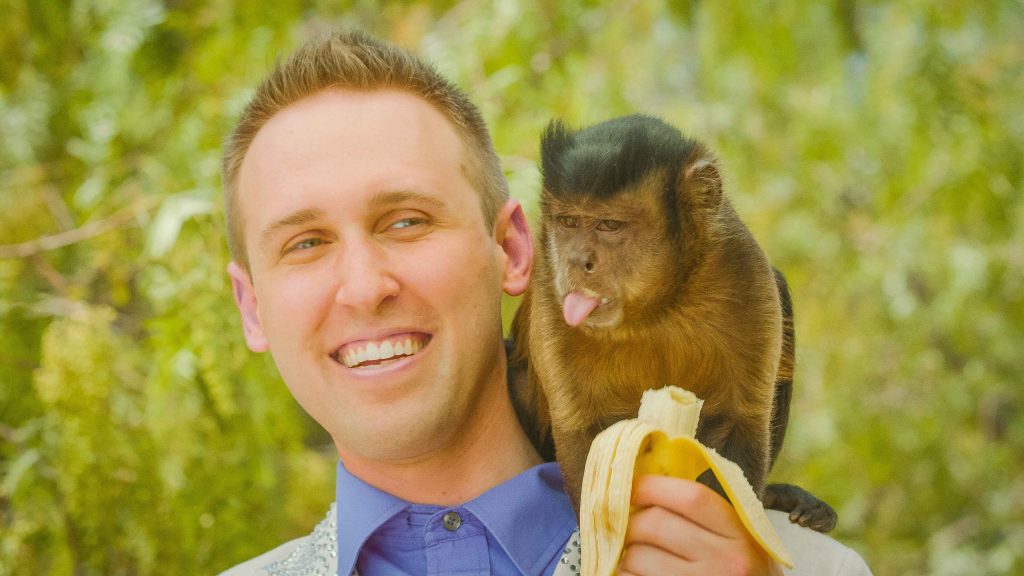 scientist feeding a monkey 